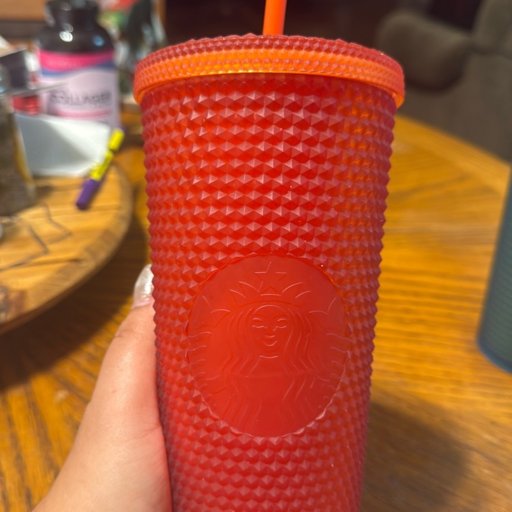 Gently used-  Starbucks 24oz Red studded tumbler.